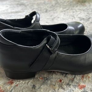 Black tap shoes. Size seven.